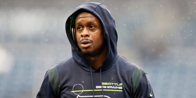 Geno Smith #7 of the Seattle Seahawks looks on before the game against the Detroit Lions at Lumen Field on January 02, 2022 in Seattle, Washington.