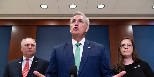 House Minority Leader Kevin McCarthy, flanked by Minority Whip Steve Scalise and Rep. Elise Stefanik, speaks with reporters at the Capitol, March 16, 2022.