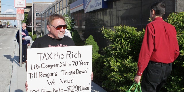 This 2012 file photo shows James Hodgkinson protesting outside the U.S. Post Office in Belleville, Illinois. Hodgkinson attempted a mass assassination of Republican members of Congress in 2017.