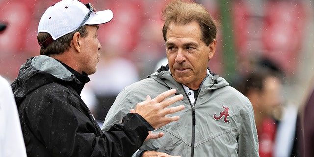 Aggies' coach Jimbo Fisher talks at with Alabama's coach Nick Saban at Bryant-Denny Stadium on Sept. 22, 2018, in Tuscaloosa, Alabama. The Crimson Tide won, 45-23.