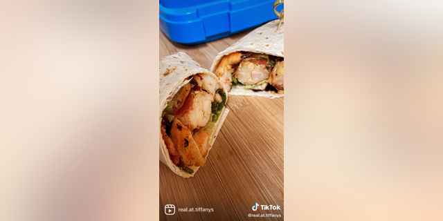 Tiffany Keene says her son Cruz, 9, is a seafood lover, which is why she incorporated a shrimp and lobster wrap into his golden birthday lunch box.
