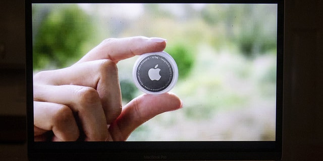 An Apple AirTag device during the Spring Loaded virtual product launch in Tiskilwa, Illinois, U.S., on Tuesday, April 20, 2021.